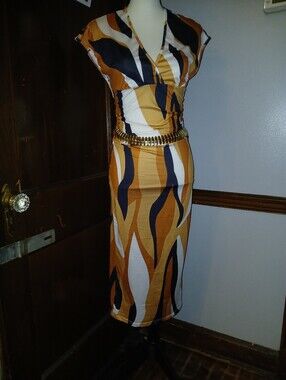 ALL ITEMS must go! PICK 5 for $20 Abstract Print Midi Skirt in Mustard and Black